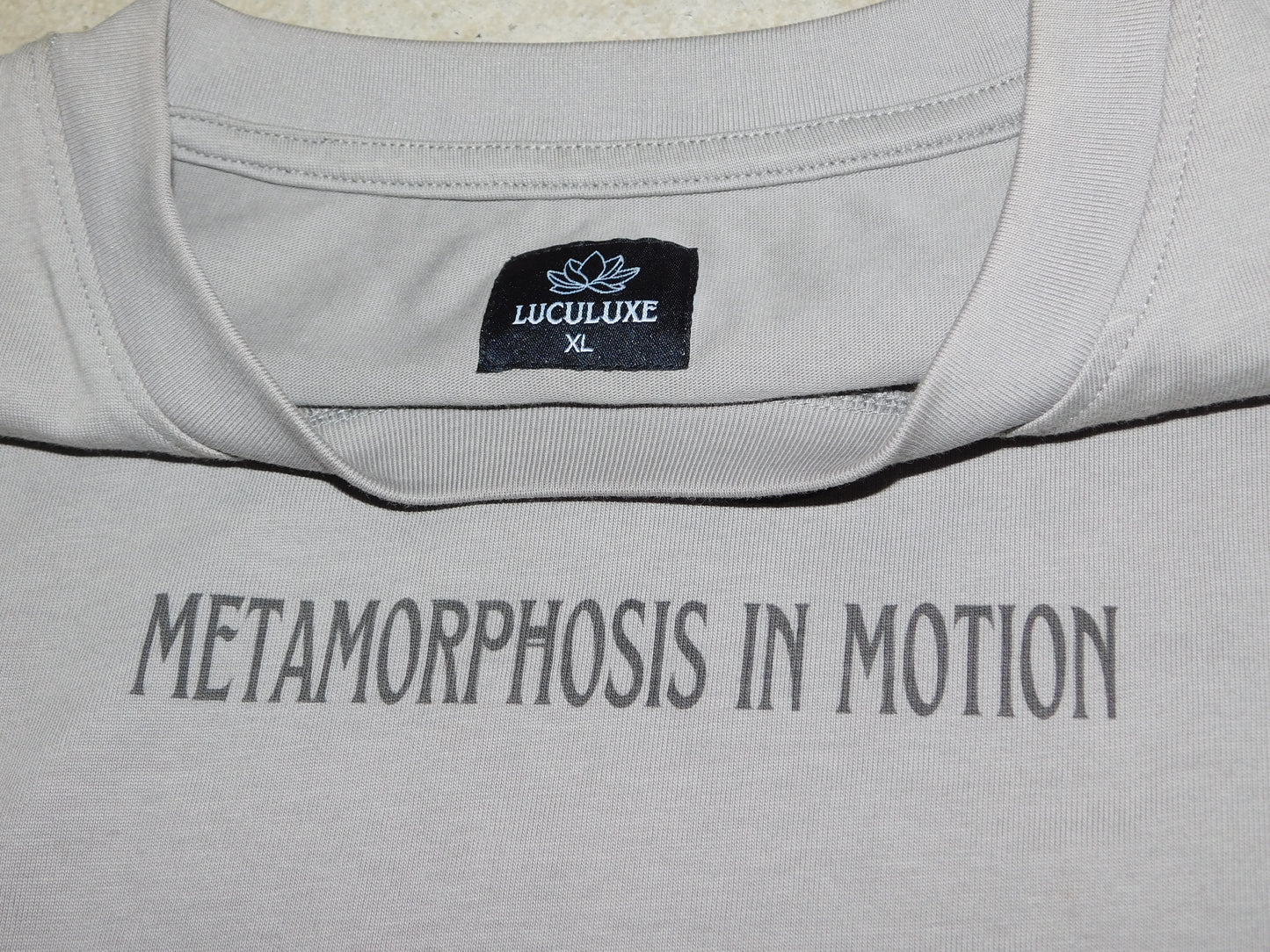 Metamorphasis in motion tee